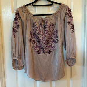 WHBM embroidered top can be worn on or off shoulder. Size small NWOT